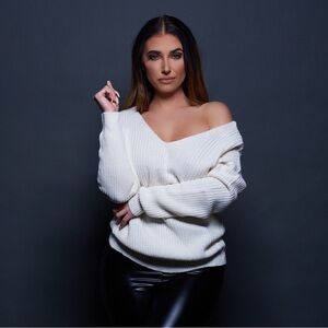 Oversized ivory sweater with cross back detail